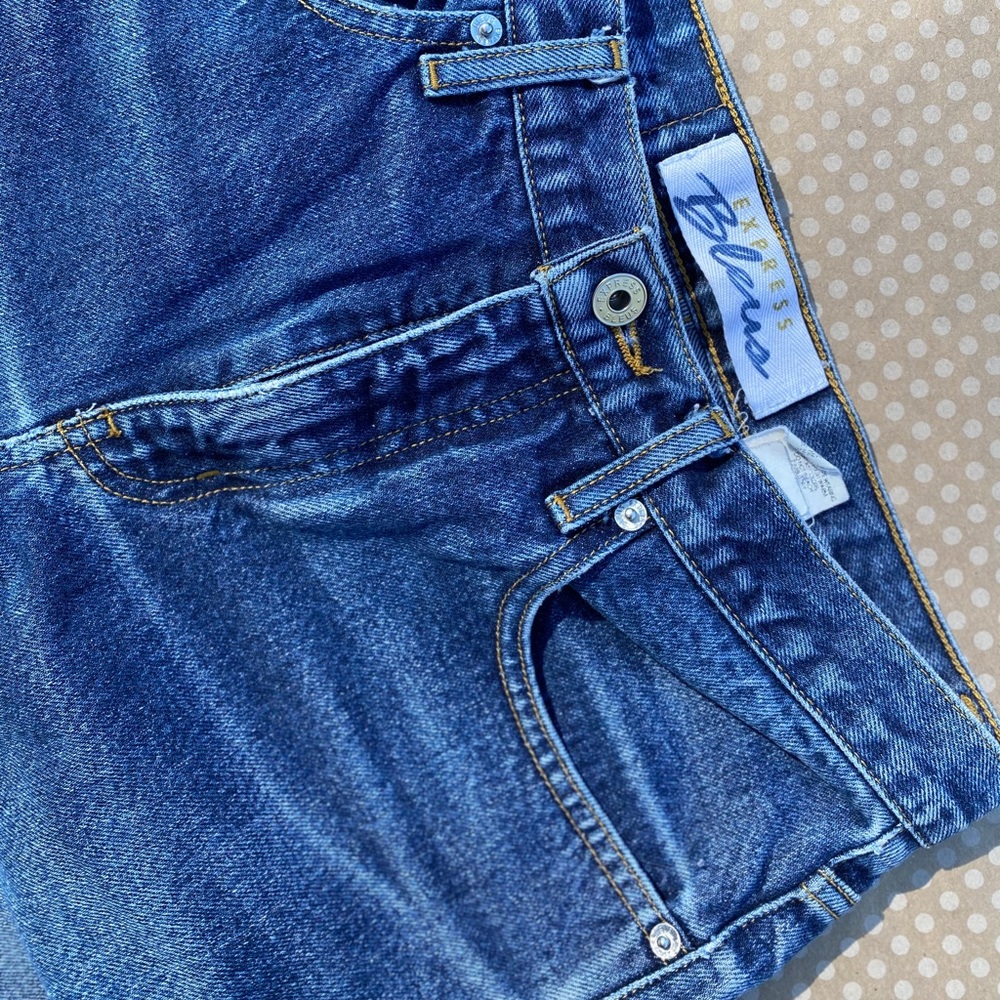 express boyfriend jeans with tear at bottom